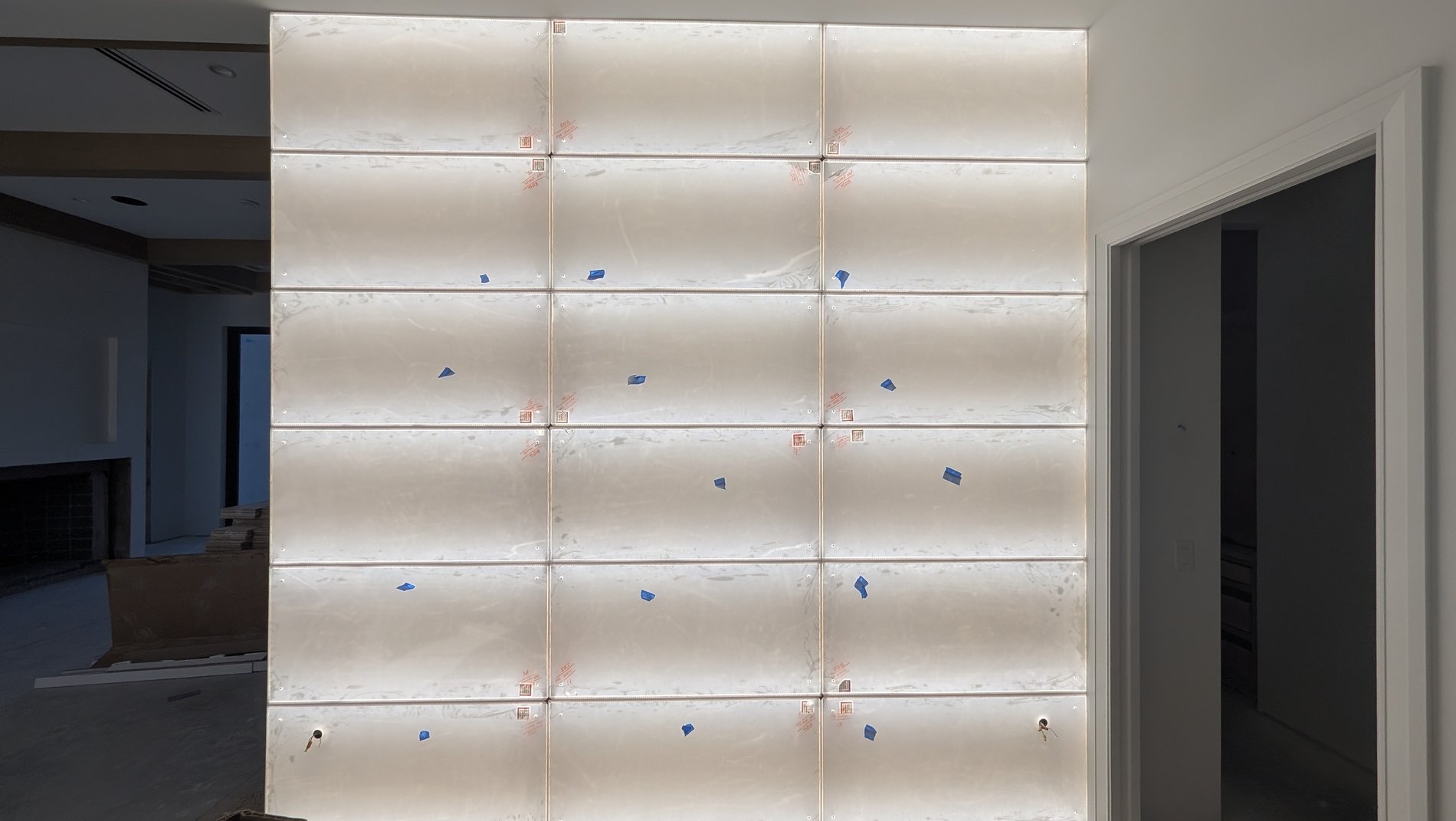 LED backlighting panels illuminated before stone installation, Winter Park