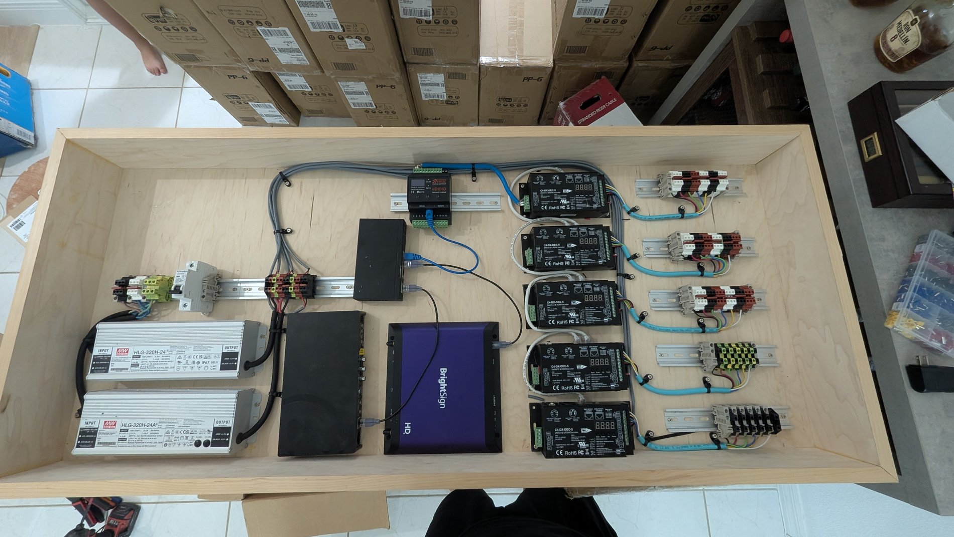 Control4 lighting control rack for custom home theater, Windermere